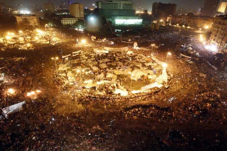 Protesters celebrate in Tahrir Square after the announcement of Mubarak's resignation